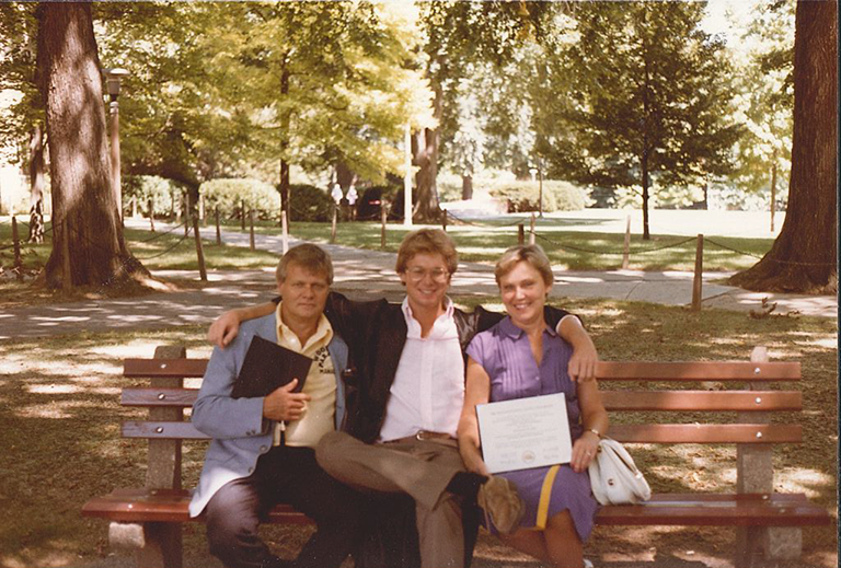 Greg and his parents day of graduation. Greg and his parents day of graduation.